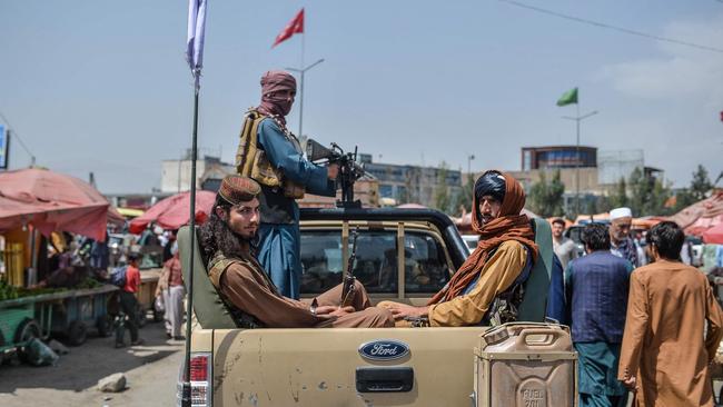 Taliban fighters in a market area of Kabul. Picture: AFP