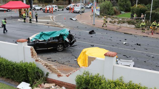 Emergency services crews examine the scene of the fatal crash at Urrbrae, where Chief-Supt Joanne Shanahan and Tania McNeill were killed. Picture: Dean Martin/AAP