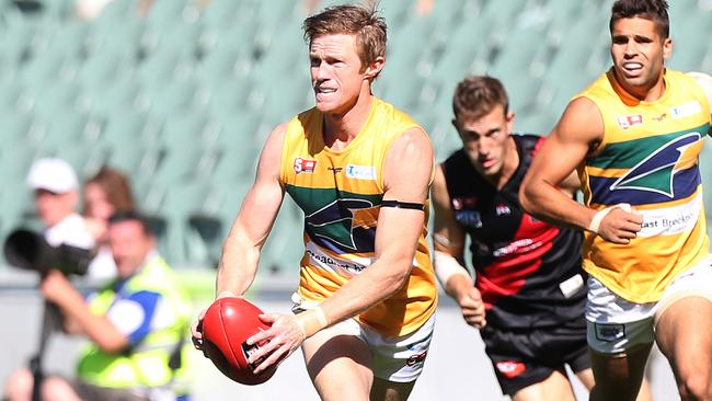 Eagle Luke Jarrad dashes out of defence. Picture: Stephen Laffer