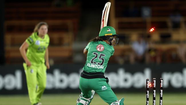 Stars' Tess Flintoff is bowled by Thunder's Hannah Darlington at North Sydney Oval. Picture: Phil Hillyard