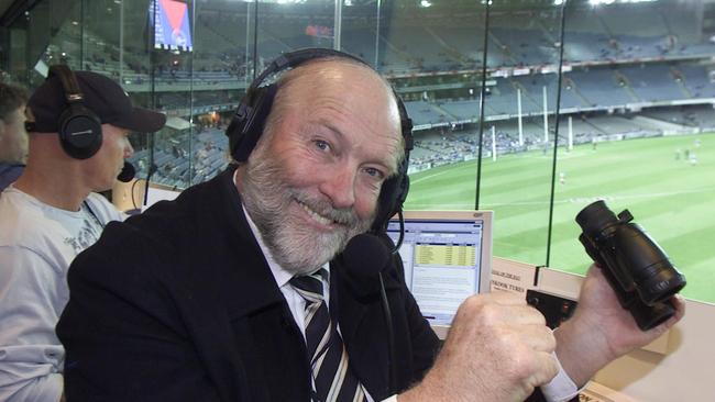 Rex Hunt calls a match at Telstra Dome in Melbourne in 2004. Photo: David Crosling.