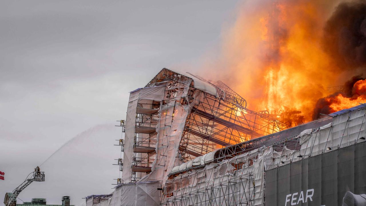 A fire rips through the Børsbygningen in Copenhagen, Denmark. Picture: Ida Marie Odgaard / Ritzau Scanpix / AFP