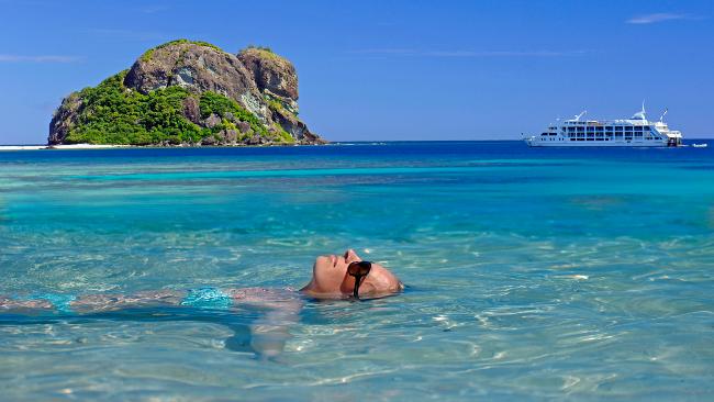 For the more adventurous, there are snorkelling and scuba lessons. Picture: Captain Cook Cruises