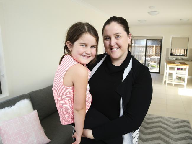 Lauren Penn and her daughter Savannah, 6, at their brand new townhouse, in Potts Hill / Picture: Justin Lloyd