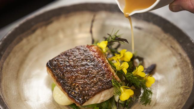 Pan-seared Murray cod with winter vegetables, and yellow bean sauce at Eleven. Picture: Matt Loxton