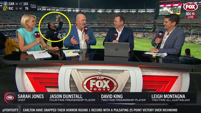 A fan snuck into the camera shot on Fox Footy. Photo: Kayo.