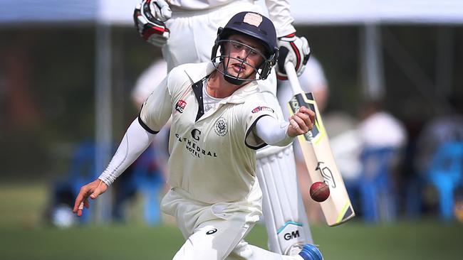 Adelaide University’s James McCollum drops a catch while fielding in close during a grade cricket match last season. Picture: AAP/Dean Martin