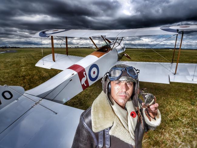 Flight Lieutenant Chris Tulk with a Sopwith Pup at RAAF Base Williams.