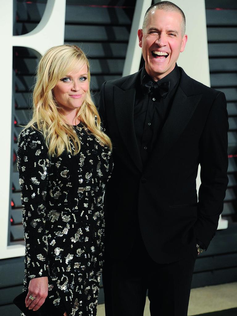 Actress Reese Witherspoon and husband Jim Toth (Photo by Gregg DeGuire/Getty Images)