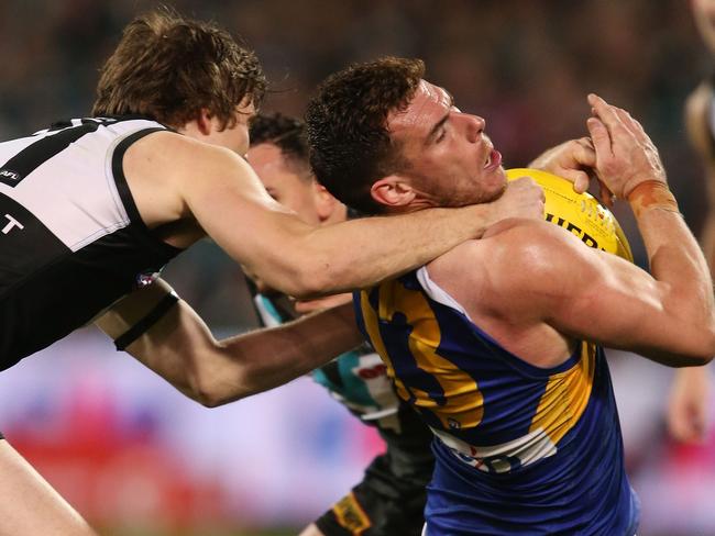 Jared Polec infringed for this high tackle on Luke Shuey. Picture: Getty Images