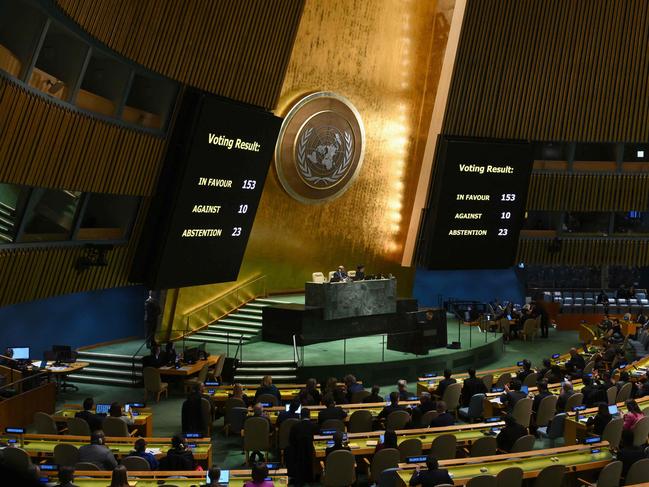 A general view shows voting results during a United Nations General Assembly meeting to vote on a non-binding resolution demanding "an immediate humanitarian ceasefire" in Gaza at UN headquarters in New York on December 12, 2023. (Photo by ANGELA WEISS / AFP)