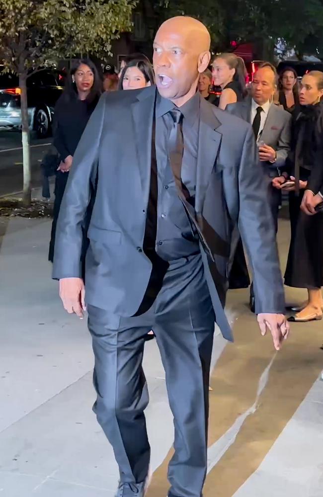 Denzel Washington fired up on a group of autograph seekers as he arrived at the Museum of Modern Art to attend a benefit on October 24. Picture: BACKGRID