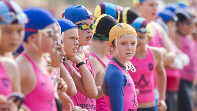 Competitors on the starting line before the under-9 boys surf race. Picture: Troy Snook