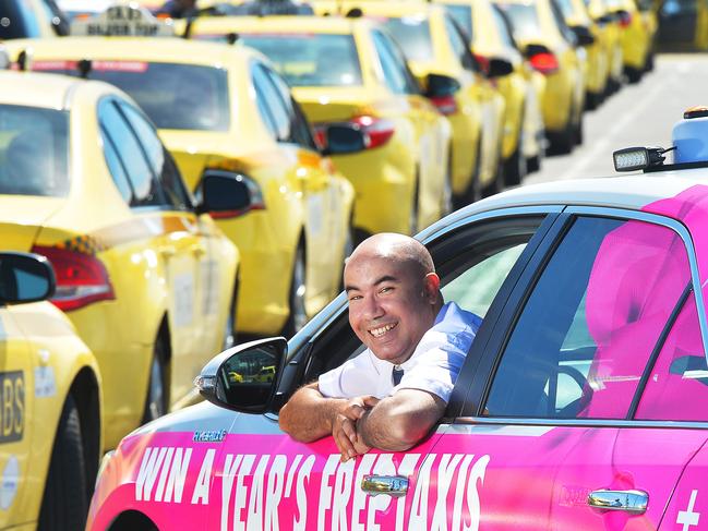 Adel Smida with his pink marked cab.Melbournes taxi industry is rebooting itself to lure passengers back and unleashed war on controversial ride-sharing app Uber. It has for the first time admitted it has let passengers down, vowing to lift its game and understand passenger expectations, including not talking on mobile phones when ferrying around passengers. Up until now, the taxi industry has responded with anti-Uber campaigns and industrial strike action to blast the US-giant, only to off put its customers. In a bid to entice jaded passengers back to taxis, the taxi industry is bringing in state-of-the-art training simulators to train new and exciting drivers, enhancements to booking technology allowing customers to choose to share contact details with their driver, real time mapping, pre-trip fare estimates and taxi tracker technology. The hit list also includes how to better engage with customers, personal grooming and hygiene and improving their direction knowledge. The Victorian Taxi Association is also launching a public relation blitz with campaign, Your Taxis, which gives one taxi passenger a chance to win free cab travel for 12 months. Today (MONDAY) passengers can also score free rides in one of four campaign taxis that are wrapped in pink .Picture:Rob Leeson.