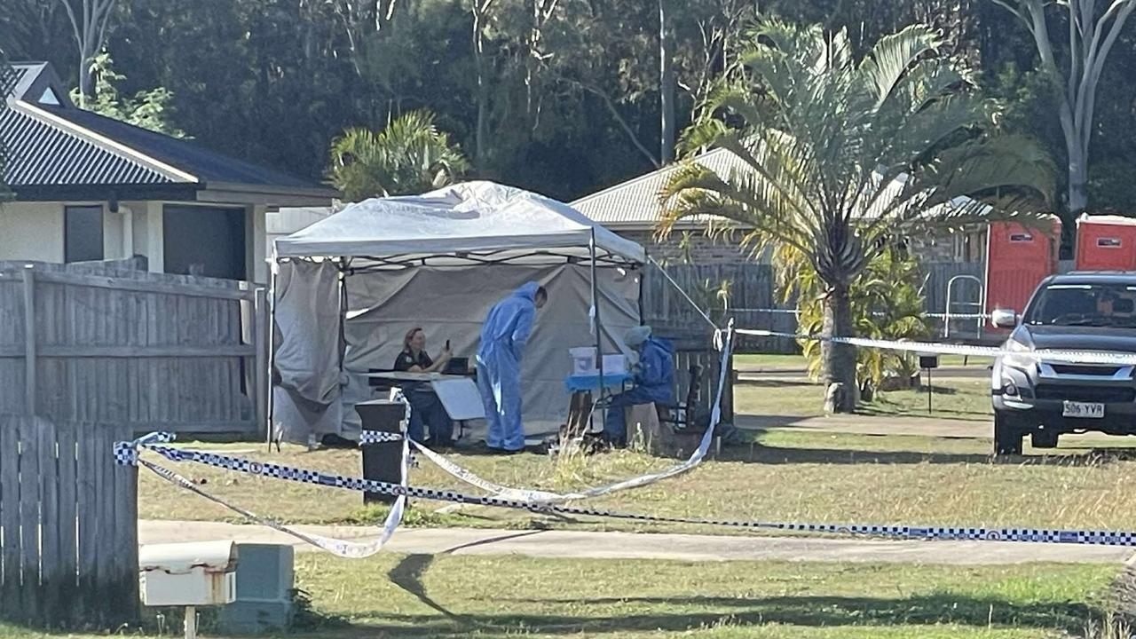 Police outside a home at Moore Park Beach where Sophia was allegedly murdered.