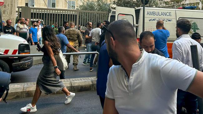 Paramedics bring the wounded to a hospital in Beirut. Picture: AFP.