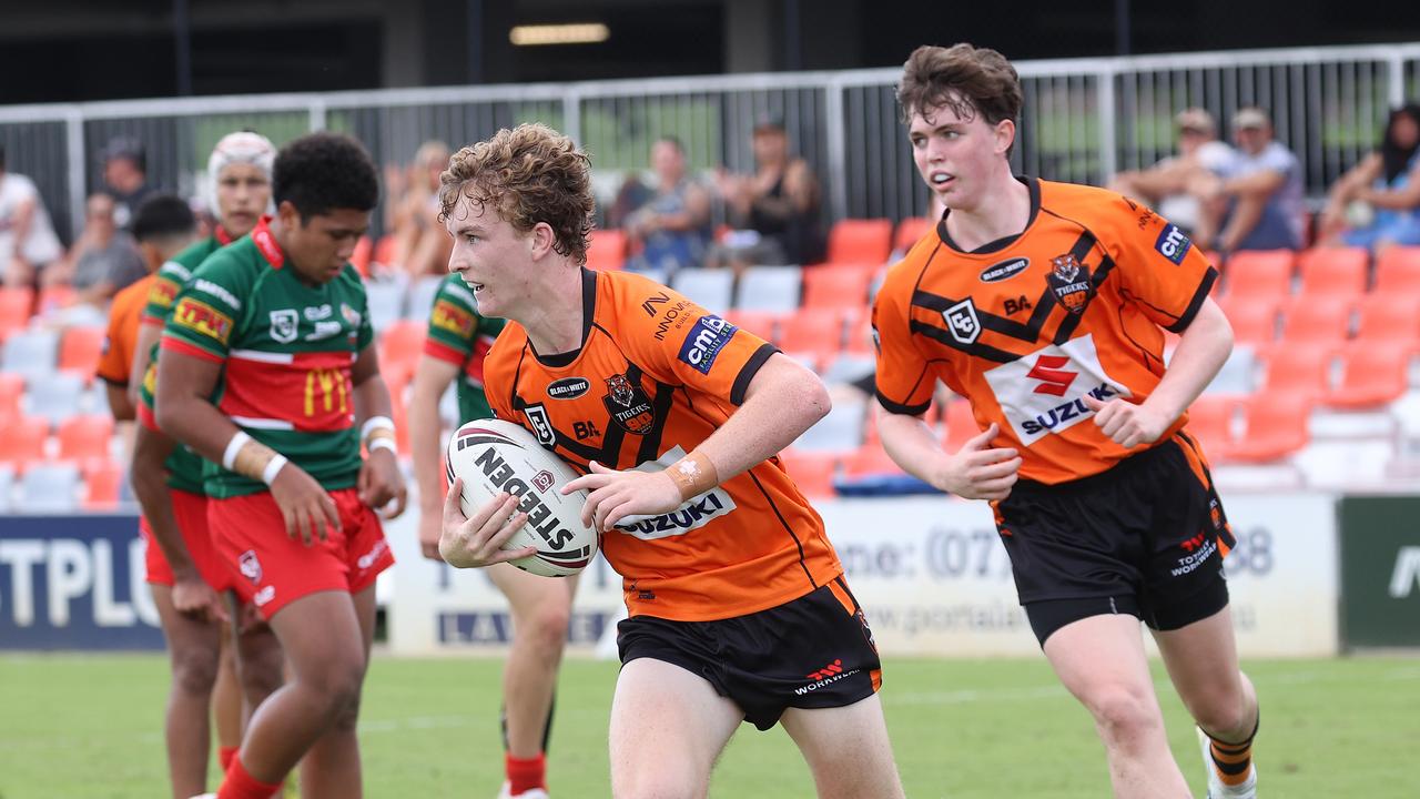 Tigers halfback Elijah Breen scoring last season. Picture: Liam Kidston.