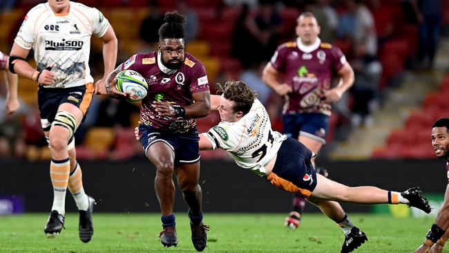 The Reds’ Moses Sorovi breaks away from the defence during the round 10 Super Rugby AU against the Brumbies at Suncorp Stadium on Saturday. Picture: Getty Images