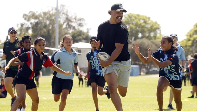 Latrell Mitchell playing touch footy with the kids in Kempsey. Picture: Sam Ruttyn