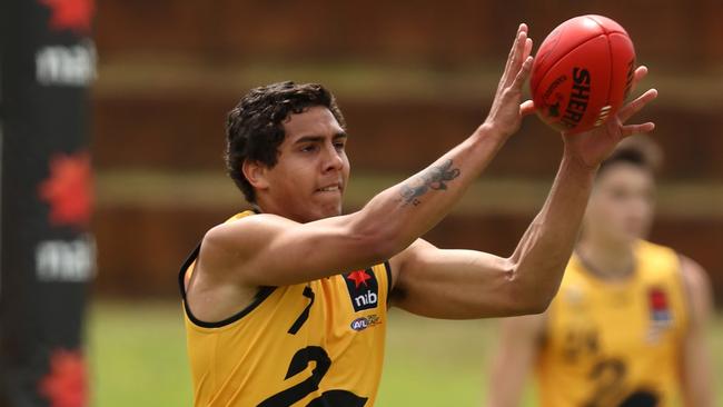 Isiah Winder of WA Gold warms up during the Western Australia AFL Draft All Stars game between WA Black and WA Gold at Medibank Oval on October 10, 2020 in Perth, Australia. (Photo by Paul Kane/AFL Photos/via Getty Images)