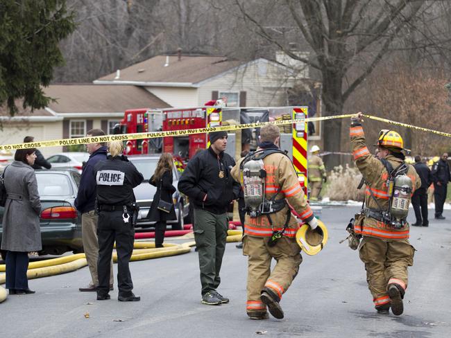 Firefighters on scene at the crash that’s killed three. (AP Photo/Jose Luis Magana)