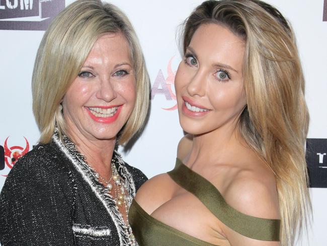 LOS ANGELES, CALIFORNIA - APRIL 01:  Singer Olivia Newton-John and her daughter Chloe Lattanzi on the red carpet for the Premiere of Syfy's "Dead 7" at Harmony Gold on April 1, 2016 in Los Angeles, California.  (Photo by Paul Redmond/WireImage)