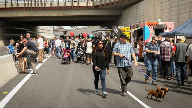 People walk under the bridge for the Torrens to Torrens open day.