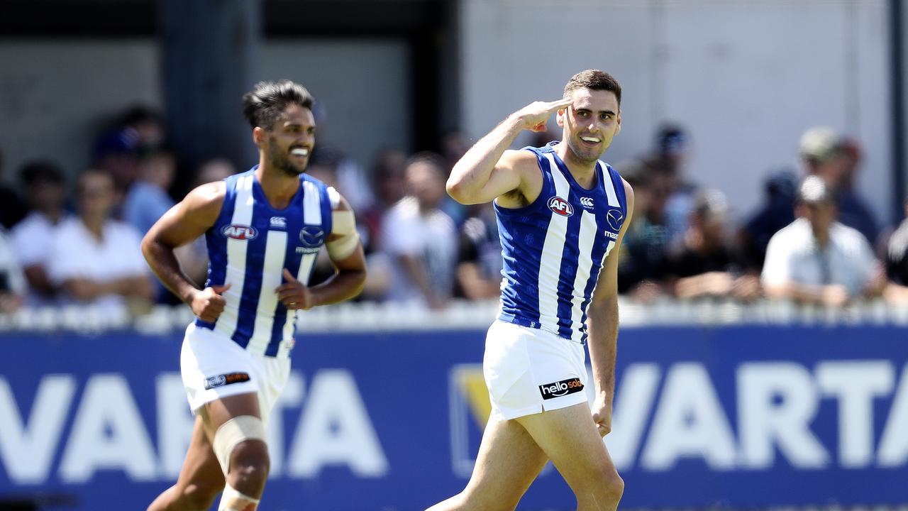 Paul Ahern kicks a goal.