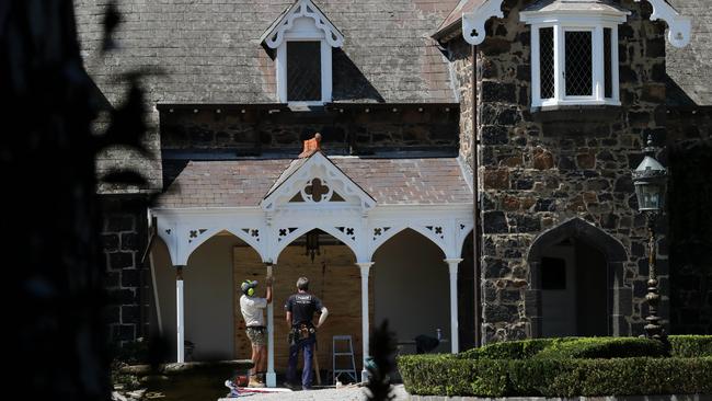 Tradesman work on Ahmed Fahour’s mansion in Hawthorn, in Melbourne’s inner east, as the property undergoes a two-year renovation. Picture: David Geraghty