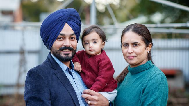 Kirandeep Singh and his wife Suminder and baby Gehar (10 months) at home in Klemzig. Picture Matt Turner.