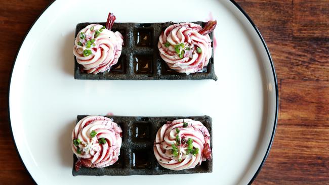 Power punch: Black garlic waffles. Picture: AAP/Sarah Marshall