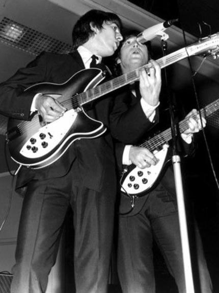 George Harrison and John Lennon in Melbourne in 1964.
