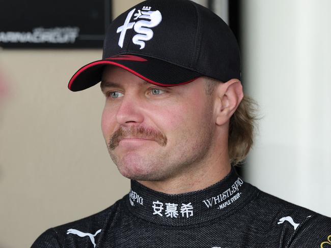 Alfa Romeo's Finnish driver Valtteri Bottas looks on in the pits during the first practice session for the Abu Dhabi Formula One Grand Prix at the Yas Marina Circuit in the Emirati city on November 24, 2023. (Photo by Giuseppe CACACE / AFP)