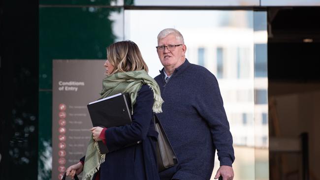 Mark Barnett (right) leaves Geelong Magistrates Court with his lawyer (left). Picture: Brad Fleet