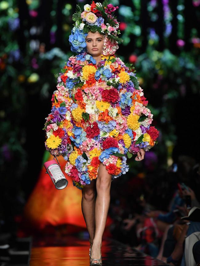 Jeremy Scotts collection for Moschino included a bouquet of looks inspired by flowers, from an orchid to a floral bouquet to a bunch of roses. Picture: AFP