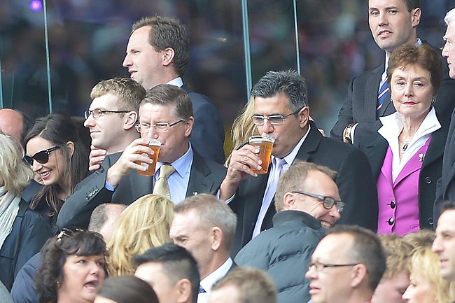 Victorian Premier Denis Napthine and AFL CEO Andrew Demetriou enjoy a beer during the AFL Grand Final. Picture: Tim Carrafa