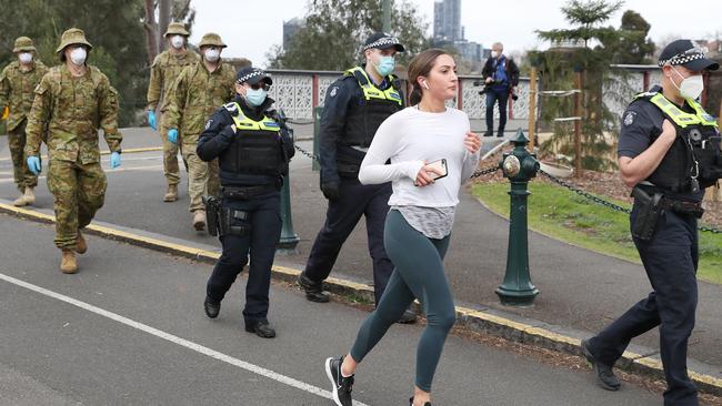 ADF and police patrol Melbourne on day one of mandatory mask wearing in Melbourne. Picture: NCA NewsWire/David Crosling