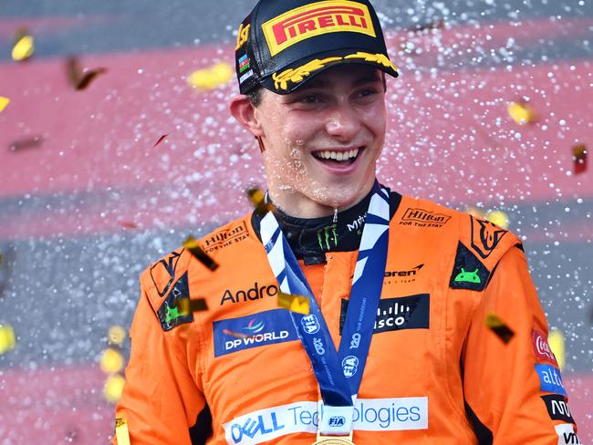 BAKU, AZERBAIJAN - SEPTEMBER 15: Race winner Oscar Piastri of Australia and McLaren celebrates on the podium during the F1 Grand Prix of Azerbaijan at Baku City Circuit on September 15, 2024 in Baku, Azerbaijan. (Photo by Dan Mullan/Getty Images)