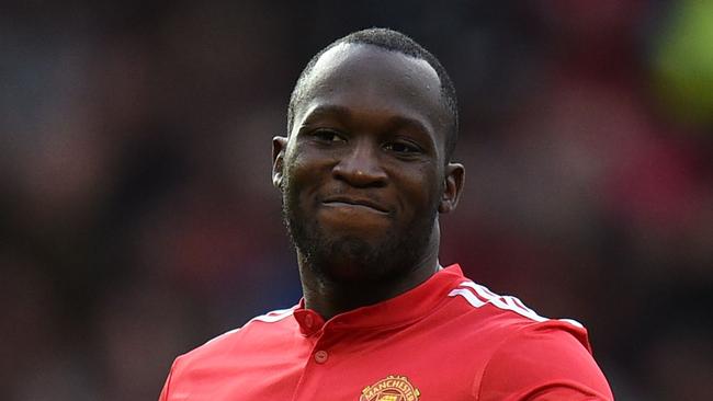 Manchester United's Belgian striker Romelu Lukaku gestures during the English Premier League football match between Manchester United and Brighton and Hove Albion at Old Trafford in Manchester, north west England, on November 25, 2017. / AFP PHOTO / Oli SCARFF / RESTRICTED TO EDITORIAL USE. No use with unauthorized audio, video, data, fixture lists, club/league logos or 'live' services. Online in-match use limited to 75 images, no video emulation. No use in betting, games or single club/league/player publications.  /