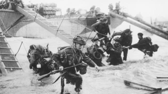 Troops from the 48th Royal Marines at Saint-Aubin-sur-mer on Juno Beach, Normandy (Photo by Hulton Archive/Getty Images)