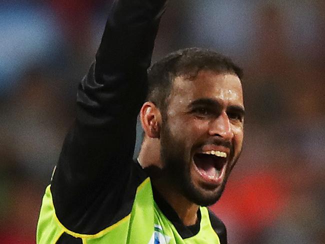 Thunder's Fawad Ahmed gets the wicket of SixersÕ Nic Maddinson lbw during opening game of BBL 07 Big Bash match between the Sydney Thunder and Sydney Sixers at Spotless Stadium. Picture. Phil Hillyard