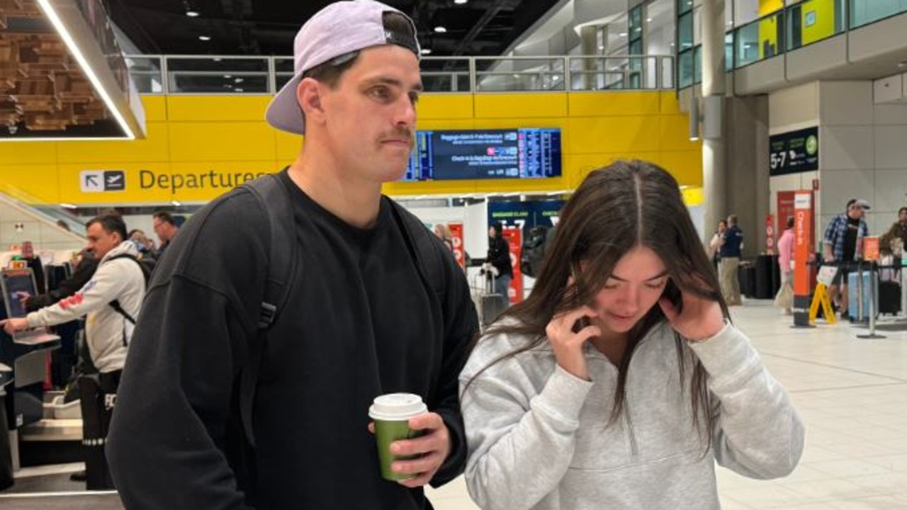 Scott Galeano and Bliss Hunter at Brisbane Airport after their Rex flight was cancelled. Picture: Isabella Pesch