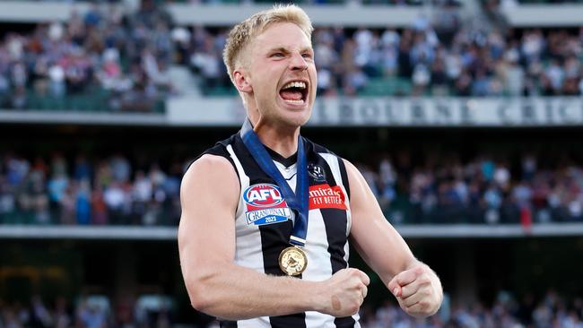 Billy Frampton celebrates after receiving his premiership medal. (Photo by Dylan Burns/AFL Photos via Getty Images)