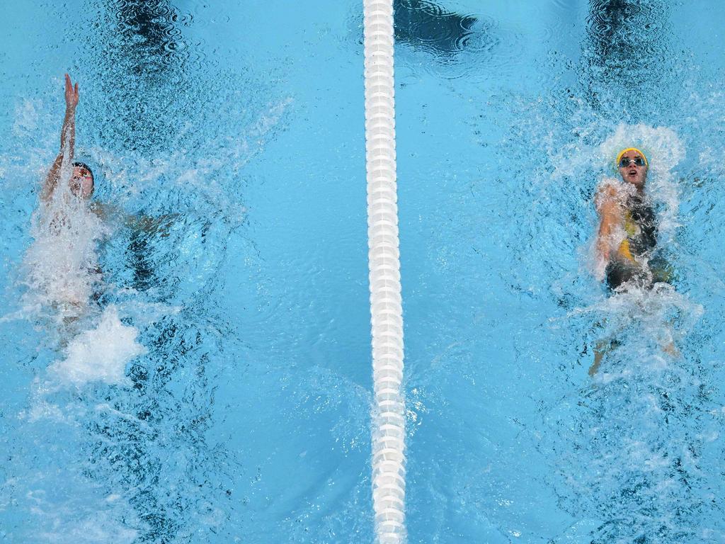 An overview shows US' Regan Smith, left, and Australia's Kaylee McKeown, right competing in the final of the women's 100m backstroke swimming event during the Paris 2024 Olympic Games at the Paris La Defense Arena in Nanterre, west of Paris, on July 30, 2024. Picture: Oli Scarff/AFP