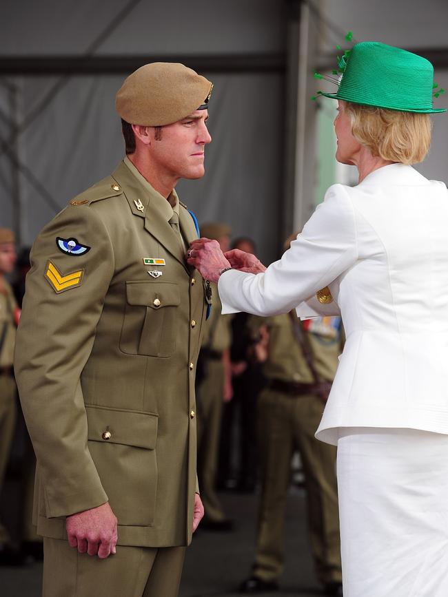 Former Governor-General Quentin Bryce awards the Victoria Cross to Corporal Benjamin Roberts-Smith. Picture: Department of Defence