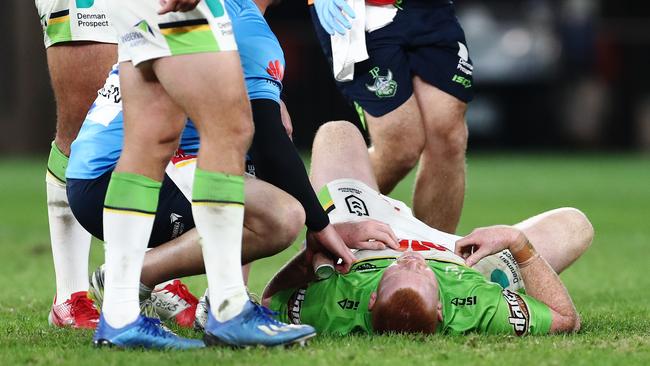 Corey Horsburgh receives attention from a trainer after injuring his leg playing the Parramatta Eels. Picture: AAP Image/Brendon Thorne