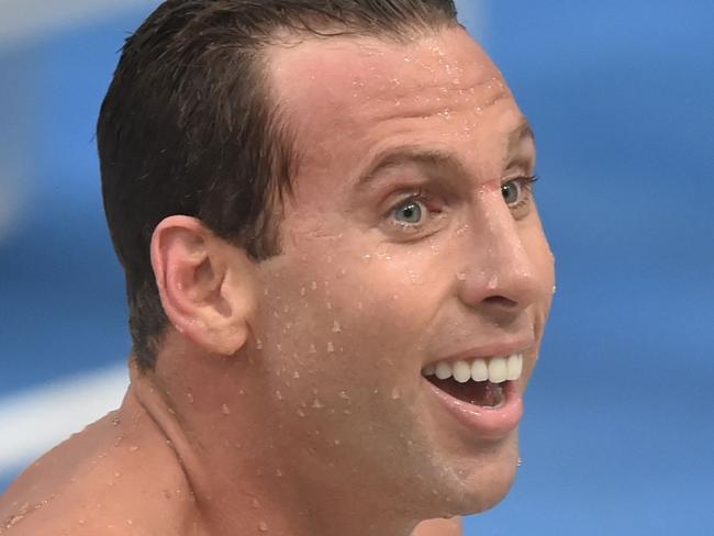 (FILES) This file photo taken on April 3, 2015 shows dual Olympic champion Grant Hackett smiling after finishing third in the 400-metres freestyle final in his comeback swim after seven years out of the pool at Australia's world championship trials in Sydney. Hackett may have been drinking prior to an alleged mid-air 