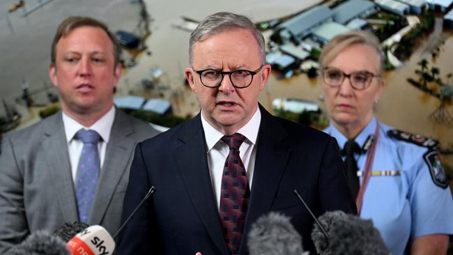 Anthony Albanese, centre, with Queensland Premier Steven Miles, left, and Queensland Police commissioner Katarina Carroll on Tuesday. Picture: Dan Peled / NCA NewsWire