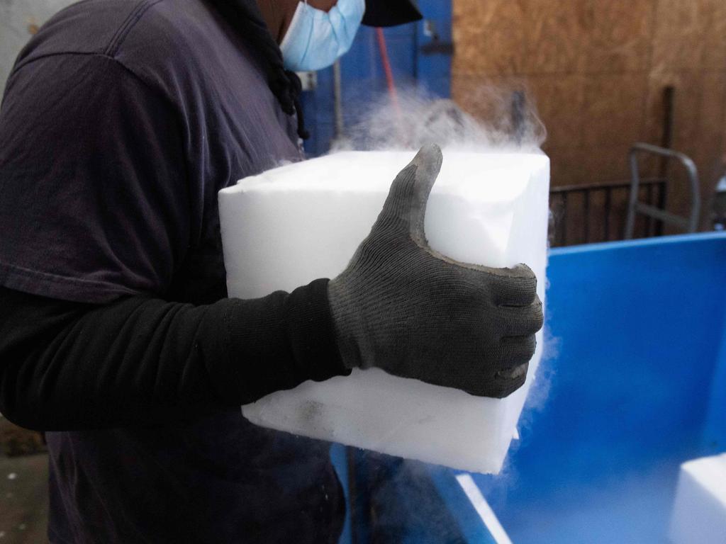 Dry ice is sure to become a hot commodity to keep vaccines cool. Picture: SAUL LOEB / AFP