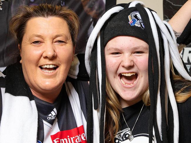 Mad Collingwood fans Tammy Holt and her 13 year old daughter Trinity are keen to fly up to Brisbane for the AFL Finals. Picture: Mark Stewart